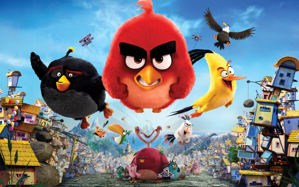 HD desktop wallpaper of The Angry Birds Movie featuring Red, Chuck, Bomb, and other characters flying and running against a colorful village backdrop.