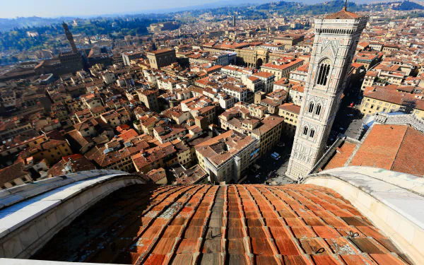 A stunning HD cityscape of Florence, Italy, featuring the iconic historic houses and man-made architecture from a high vantage point.