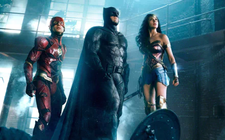 HD desktop wallpaper featuring Gal Gadot as Wonder Woman, Ben Affleck as Batman, and Ezra Miller as Flash from the movie Justice League in a dramatic pose.