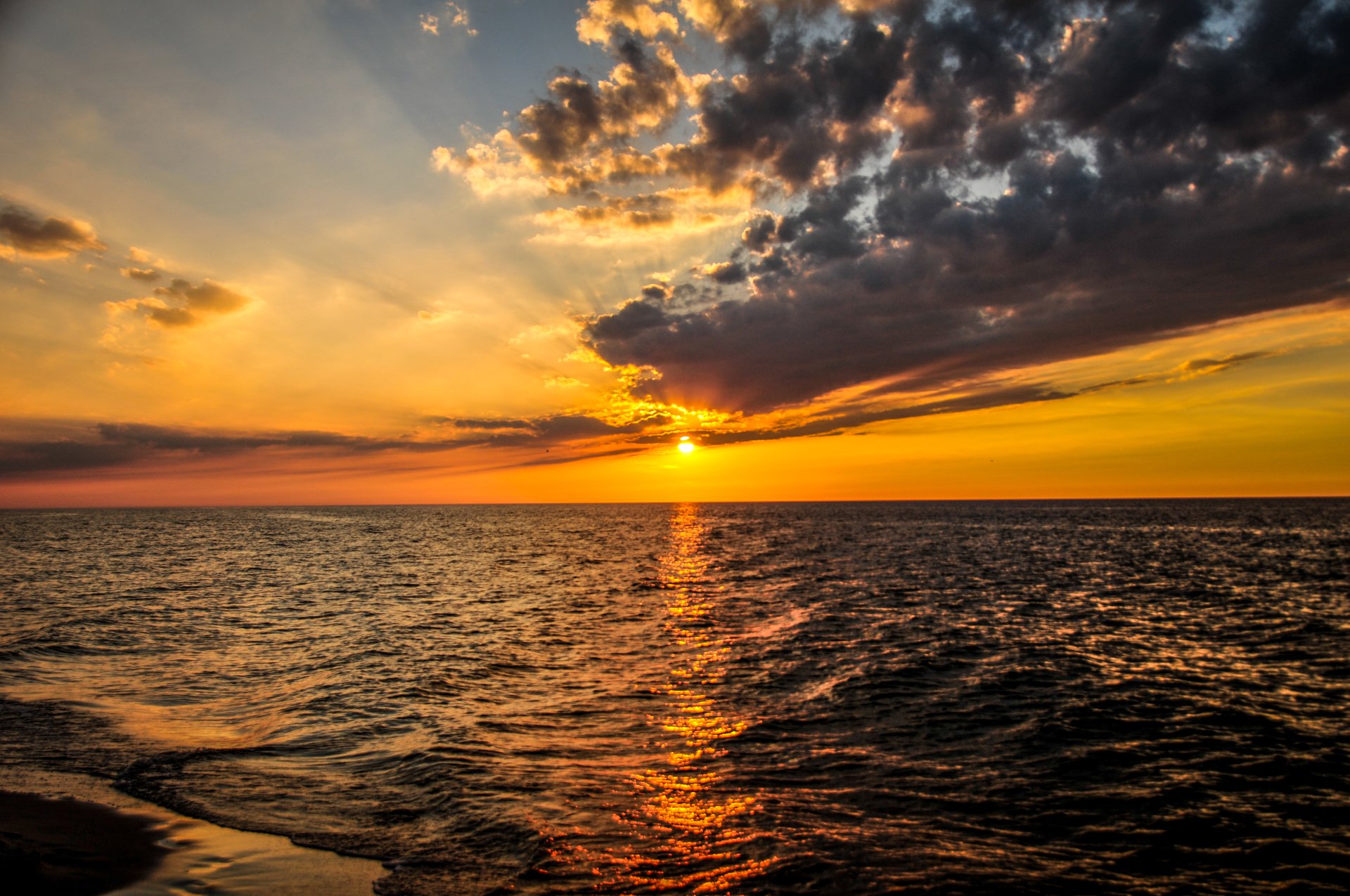 Ocean Sunset By Kamil Porembiński