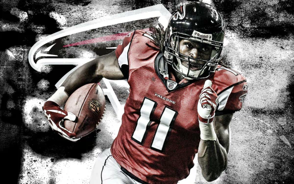 HD wallpaper featuring a dynamic action shot of football player Julio Jones in a red jersey, carrying a football with intense focus.