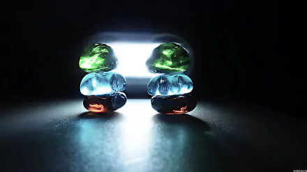 Artistic 4K Ultra HD desktop wallpaper featuring stacked green, amber, and blue crystal-like orbs illuminated by a soft light against a dark background.