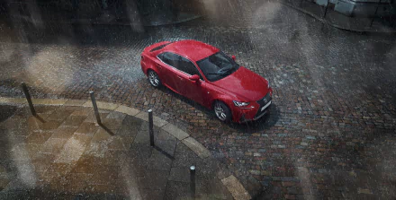 Red Lexus IS on wet cobblestone under heavy rain; HD PC desktop wallpaper/background of the car and vehicle.