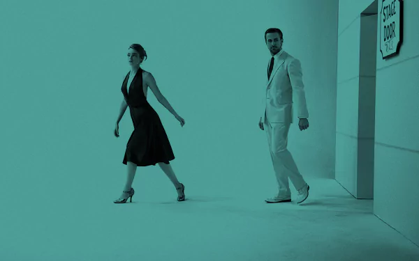 HD wallpaper of Ryan Gosling and Emma Stone from the movie La La Land. The image features both actors in formal attire, with a stylish monochrome background.