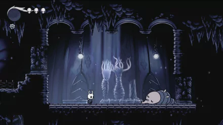 A captivating HD desktop wallpaper from the video game Hollow Knight, featuring the iconic character in a shadowy, atmospheric underground setting with eerie lighting.