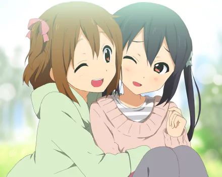 Azusa Nakano and Yui Hirasawa from the anime K-ON! share a warm hug outdoors in this HD PC desktop wallpaper and background.