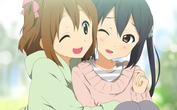 Azusa Nakano and Yui Hirasawa from the anime K-ON! share a warm hug outdoors in this HD PC desktop wallpaper and background.