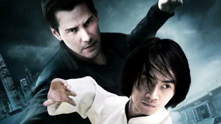 HD desktop wallpaper featuring Keanu Reeves and a martial artist from the movie Man of Tai Chi in dynamic action poses against a moody cityscape background.