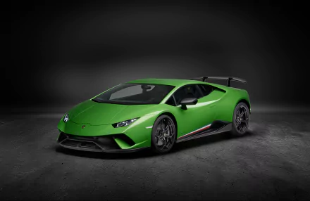 Green Lamborghini Huracan Performante supercar on a dark studio floor, shown as a 4K Ultra HD PC desktop wallpaper and background.