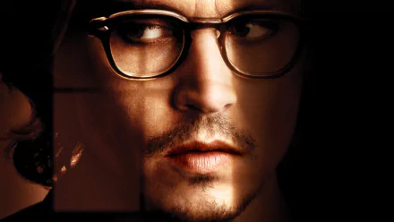 Close-up HD PC desktop wallpaper of a male actor in glasses, moody portrait from the movie Secret Window.