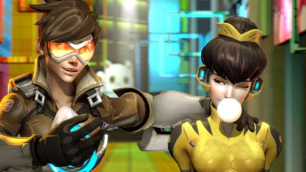 Overwatch video game HD PC desktop wallpaper: Tracer grinning with her arm out beside D.Va, who blows a bubblegum bubble against a neon-futuristic background.