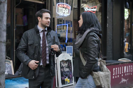 HD desktop wallpaper featuring Charlie Cox as Daredevil and Krysten Ritter as Jessica Jones in a scene from the TV show The Defenders outside Stillwater Bar & Grill.
