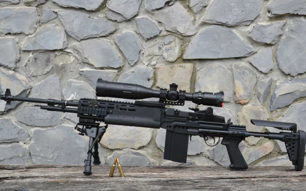 4K Ultra HD PC desktop wallpaper: man-made sniper rifle with scope and bipod resting against a stone wall, two brass cartridges on a wooden ledge.