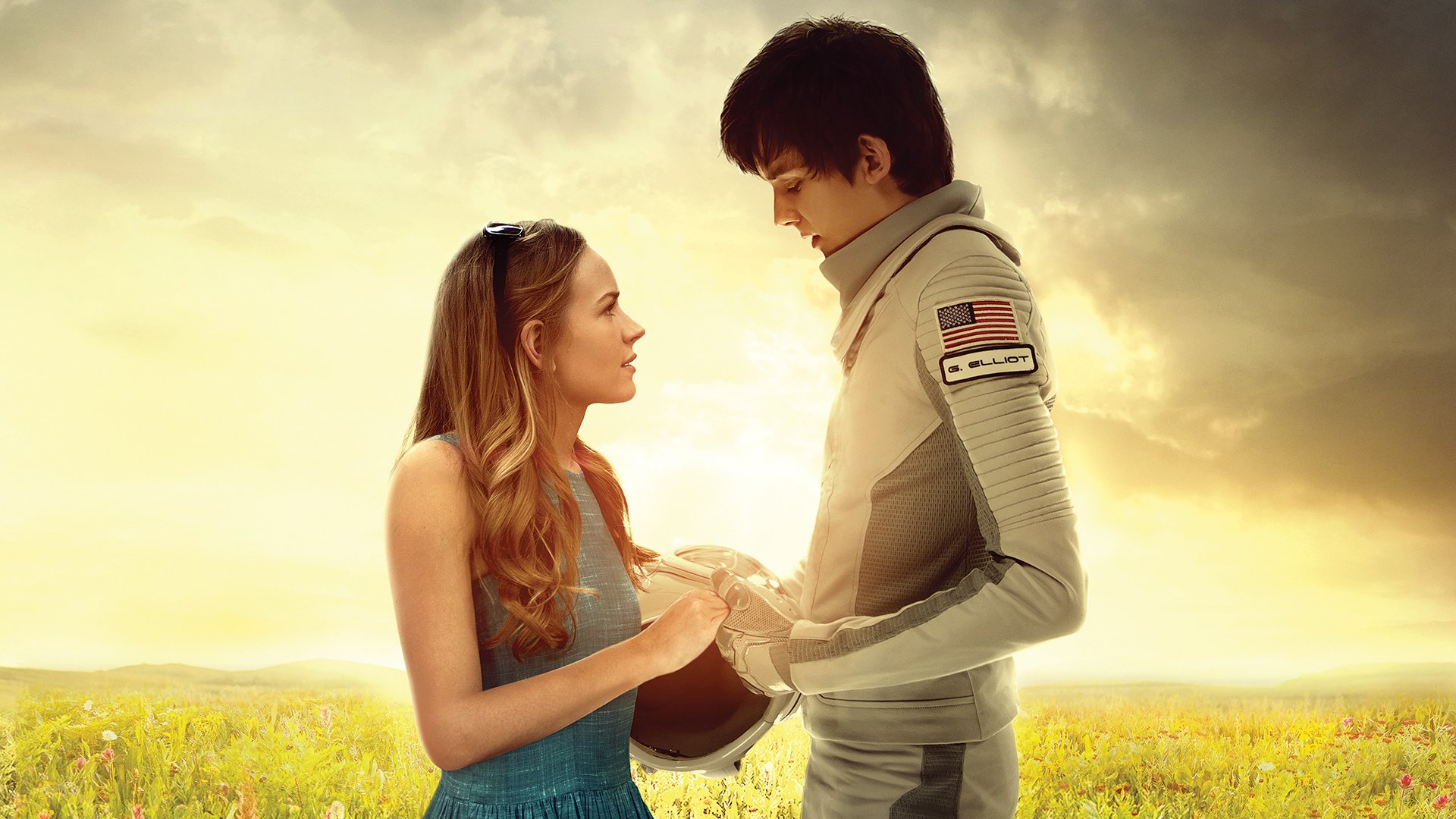 HD desktop wallpaper featuring Asa Butterfield and Britt Robertson from the movie The Space Between Us, standing face to face in a sunlit field.
