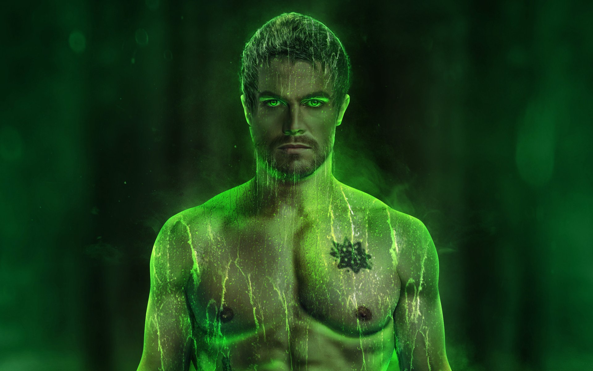 HD desktop wallpaper featuring Stephen Amell as Oliver Queen from the TV show Arrow, glowing with a vibrant green aura.