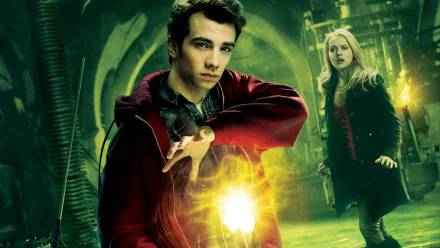 HD desktop wallpaper featuring Jay Baruchel and Teresa Palmer from the movie The Sorcerer's Apprentice, with magical glowing effects in a dark, mystical setting.