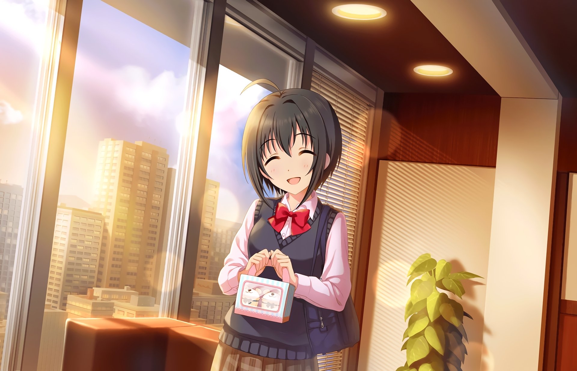 Miho Kohinata (THE iDOLM@STER: Cinderella Girls Starlight Stage) smiling in a sunlit high‑rise room, holding a small boxed lunch; HD anime PC desktop wallpaper with city skyline outside.