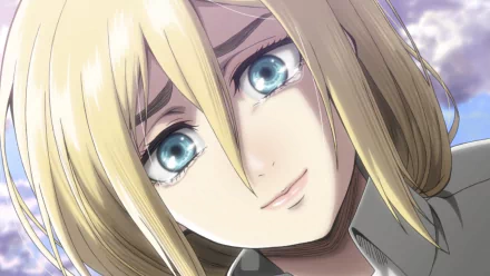 A HD desktop wallpaper of Historia Reiss from Attack on Titan. She is smiling with blue eyes and blonde hair, with tears visible, set against a background.
