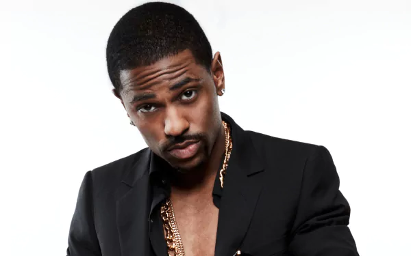 HD desktop wallpaper featuring a man in a black jacket with a gold chain.