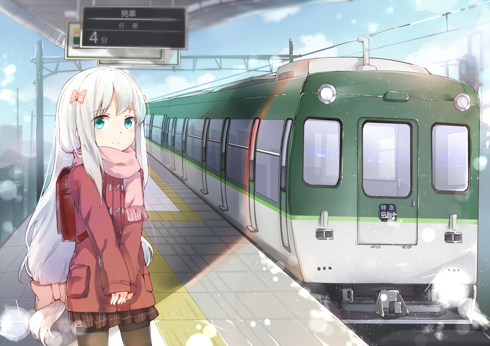 HD desktop wallpaper featuring Sagiri Izumi from the anime EroManga-Sensei, standing on a snowy train platform with a green and white train in the background.
