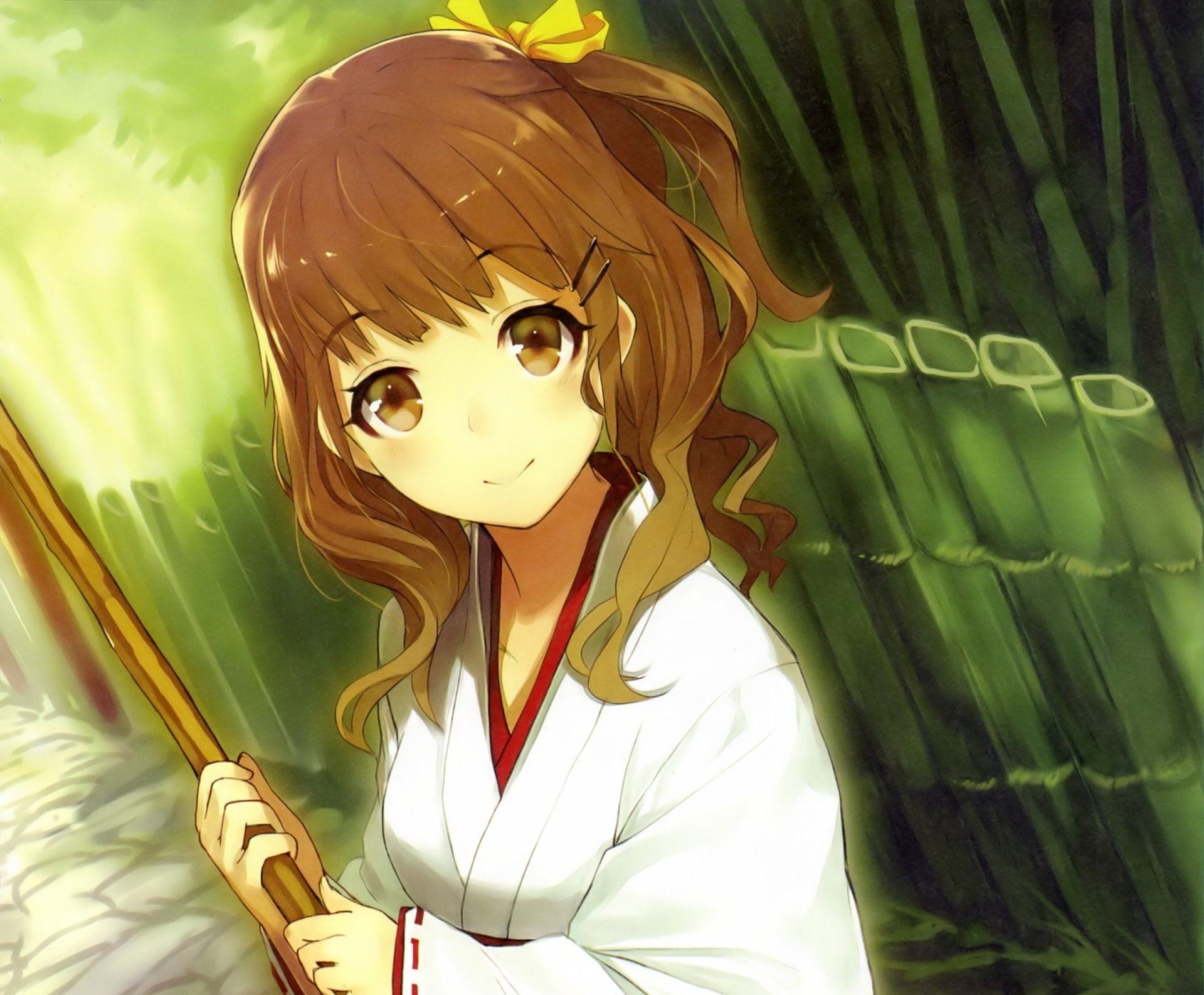 2K Quad HD original anime PC desktop wallpaper: smiling long brown-haired miko in white outfit with bow and blush, holding a broom amid bamboo, warm brown eyes.