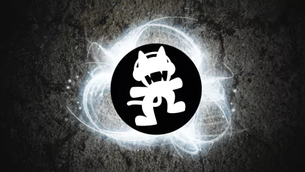 HD desktop wallpaper featuring the Monstercat logo with a glowing aura on a textured background.