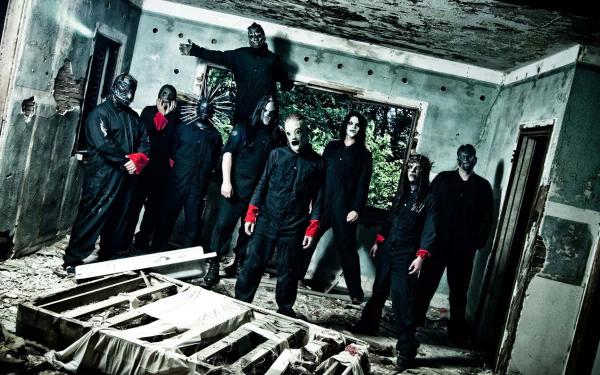 Band members posing in a dilapidated room, dressed in dark costumes with masks. Tags: heavy metal, industrial metal, nu metal, music, Slipknot. HD desktop wallpaper and background.