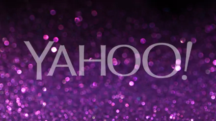 HD desktop wallpaper featuring a sparkling purple background with the Yahoo! logo centered.