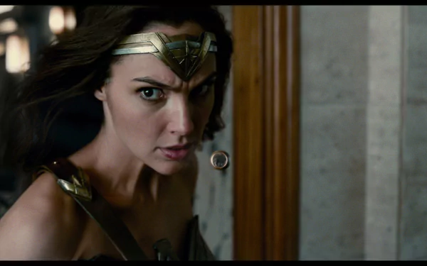 HD desktop wallpaper featuring Gal Gadot as Wonder Woman from the 2017 movie Justice League, captured in a dynamic and intense moment.