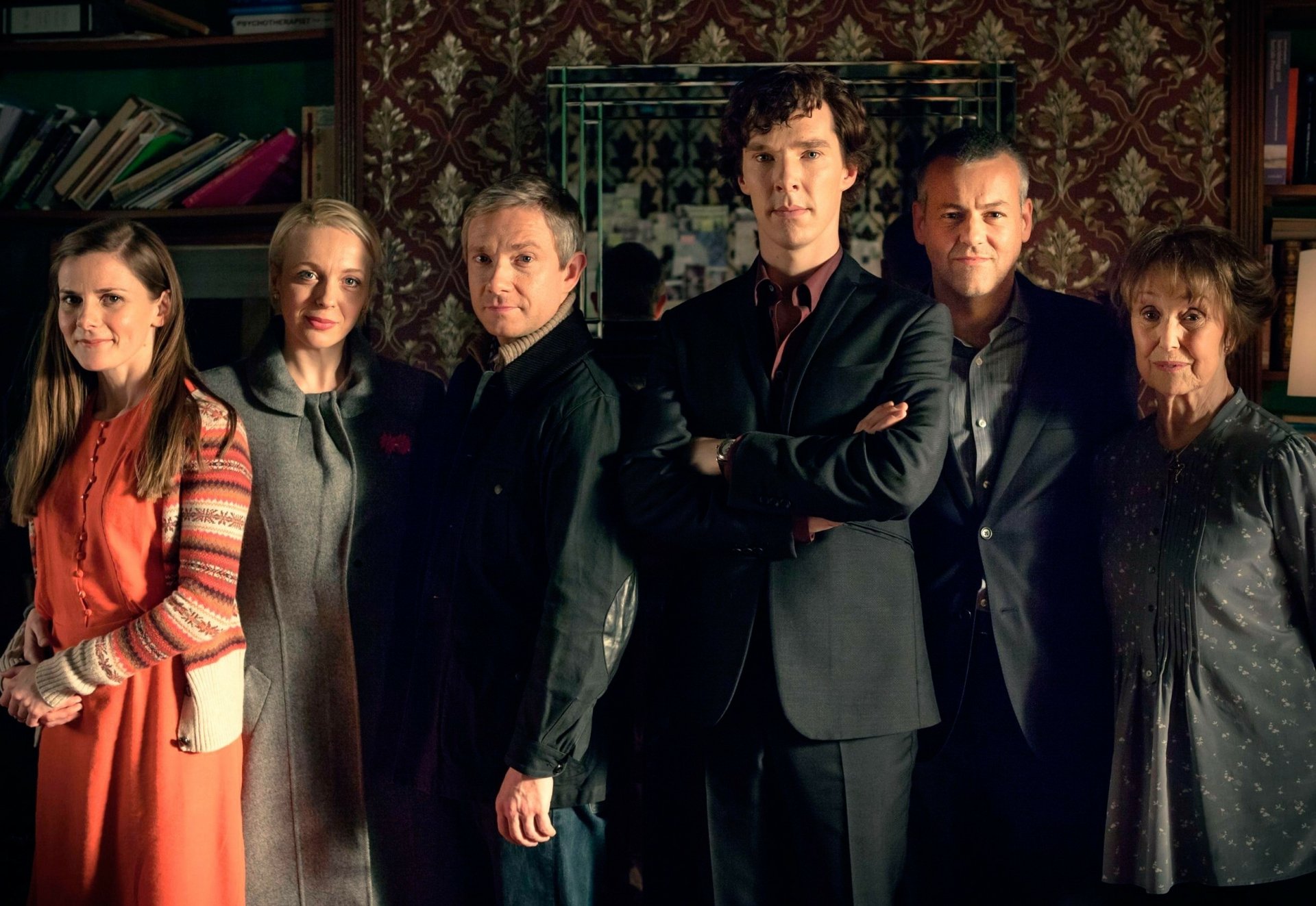 HD PC desktop wallpaper featuring the main cast of the Sherlock TV series, including Benedict Cumberbatch as Sherlock Holmes, standing in a richly decorated room.