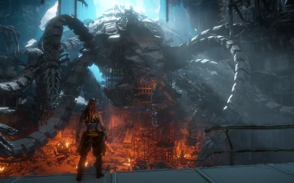 HD desktop wallpaper featuring Aloy from Horizon Zero Dawn, standing before a colossal mechanical structure amid a fiery, dilapidated environment.