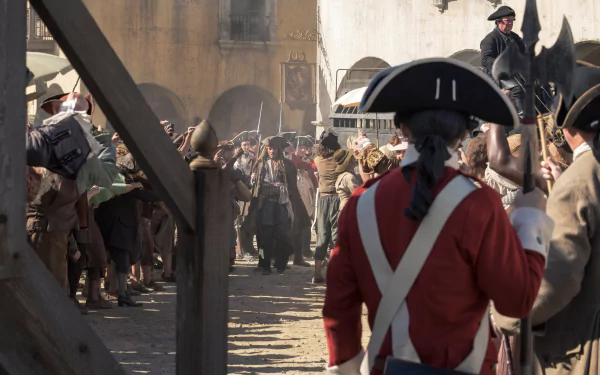 4K Ultra HD wallpaper featuring Johnny Depp as Jack Sparrow in a scene from Pirates of the Caribbean: Dead Men Tell No Tales, set in a lively, historic marketplace.