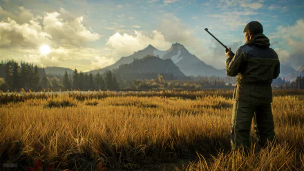theHunter: Call of The Wild video game 4K Ultra HD PC desktop wallpaper — lone hunter with rifle standing in golden marsh, looking toward distant mountains beneath a dramatic sky.