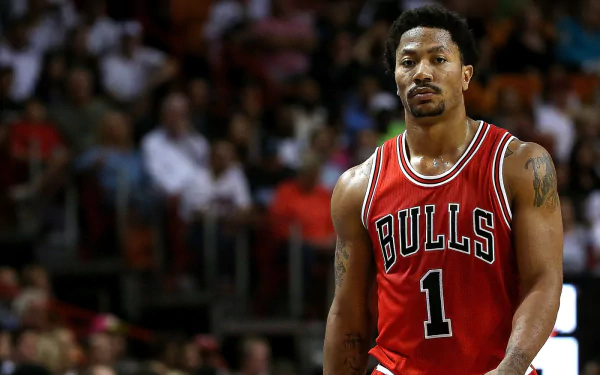 HD desktop wallpaper featuring Derrick Rose in a Chicago Bulls jersey.