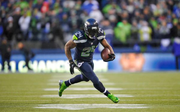 HD wallpaper of Seattle Seahawks player Marshawn Lynch in action on the football field.
