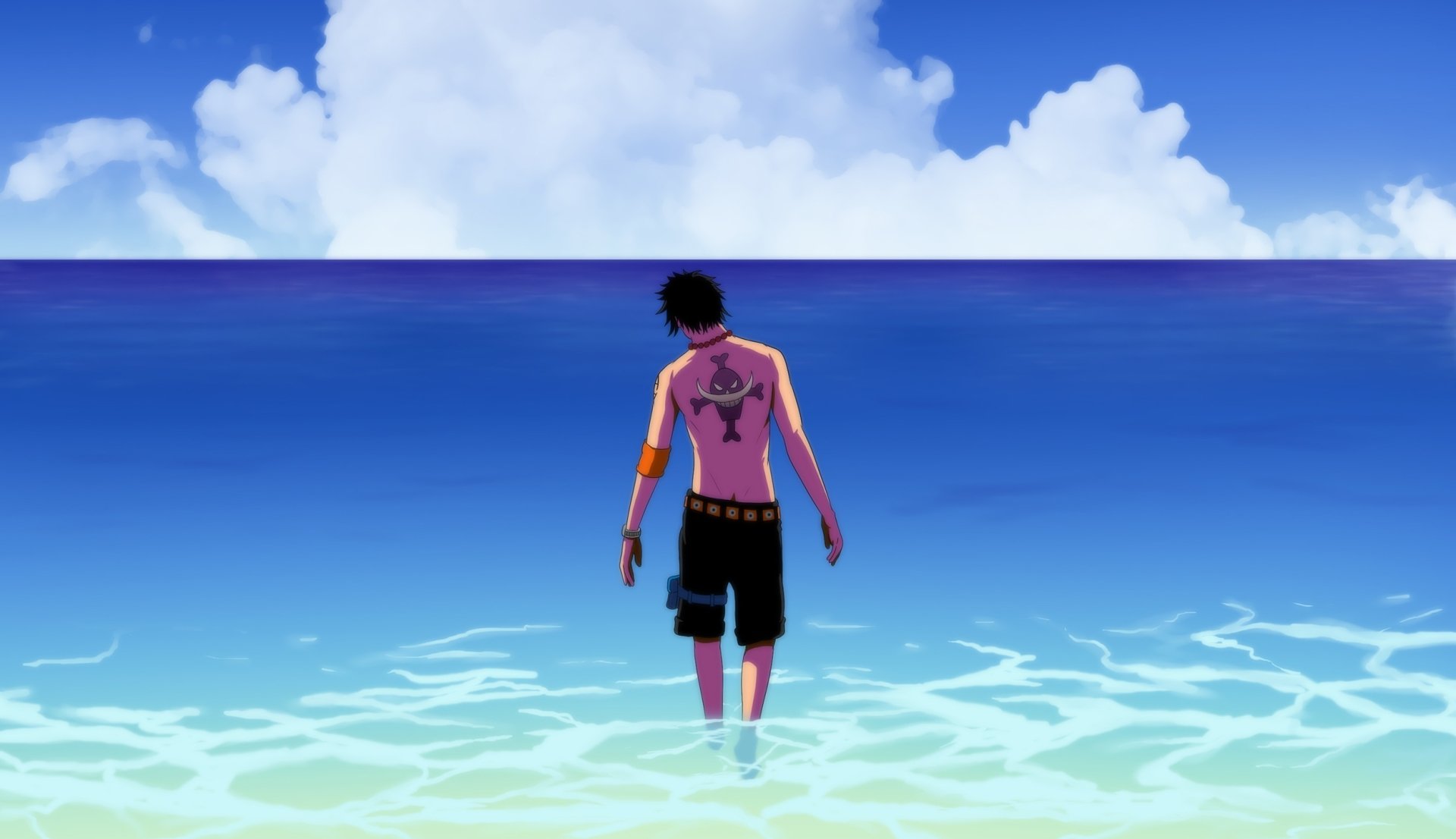 HD anime desktop wallpaper featuring Portgas D. Ace from One Piece standing in shallow ocean water under a bright blue sky with fluffy clouds.
