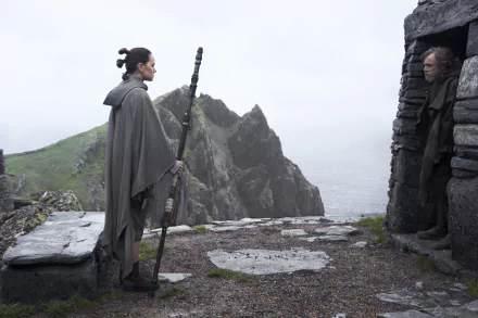 Scene from Star Wars: The Last Jedi featuring Rey and Luke Skywalker on a rocky island, presented in 4K Ultra HD for PC desktop wallpaper.