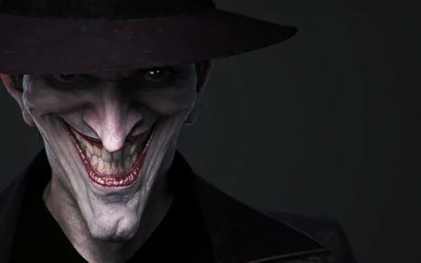 HD PC desktop wallpaper featuring the Joker from the comic Batman: The Killing Joke with a sinister grin and dark, dramatic lighting.