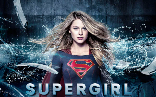 HD desktop wallpaper featuring Melissa Benoist as Supergirl from the TV show Supergirl, with a dramatic backdrop of broken glass and an intense, powerful pose.