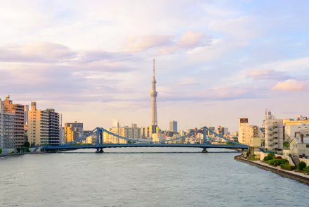 Tokyo skyline with Tokyo Skytree rising behind a bridge over the river, flanked by skyscrapers and buildings — 4K Ultra HD desktop wallpaper of man-made cityscape in Tokyo, Japan.