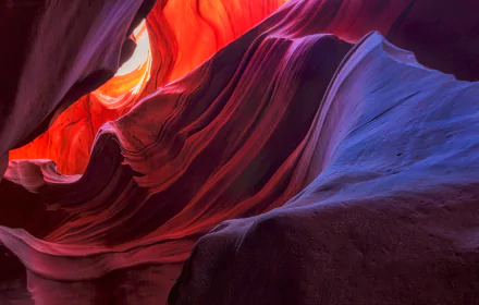 HD PC desktop wallpaper showcasing the vibrant, flowing rock formations and light beams within Antelope Canyon, highlighting nature's stunning artistry.