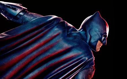HD desktop wallpaper depicting Batman from the movie Justice League (2017), showcasing a dynamic and dramatic pose of the caped crusader against a dark background.