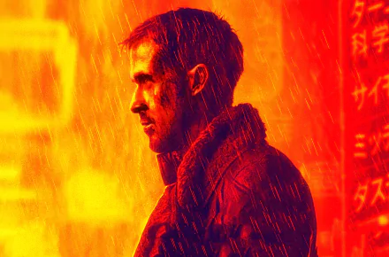 Side-profile of a rain-soaked man in a futuristic coat against neon red-orange city lights — Blade Runner 2049–style 2K quad HD desktop wallpaper.