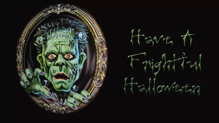 HD PC desktop wallpaper featuring a spooky Frankenstein monster framed in an ornate mirror with the eerie text Have A Frightful Halloween for the Halloween holiday.