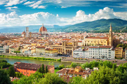 A breathtaking HD desktop wallpaper showcasing the cityscape of Florence, Italy, with a stunning view of the Florence Cathedral and other historic buildings under a vibrant sky.
