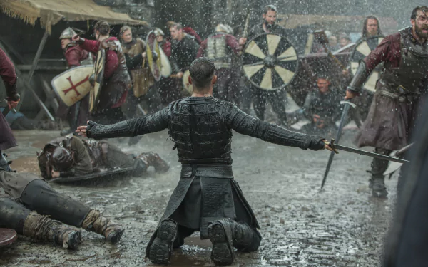 A dramatic battle scene from the TV show Vikings (2013) in 4K Ultra HD, featuring intense medieval combat and warriors in detailed armor on a rain-soaked battlefield.