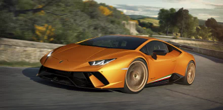 Orange Lamborghini Huracan Performante supercar on a scenic road, 4K Ultra HD PC desktop wallpaper and background of the vehicle.