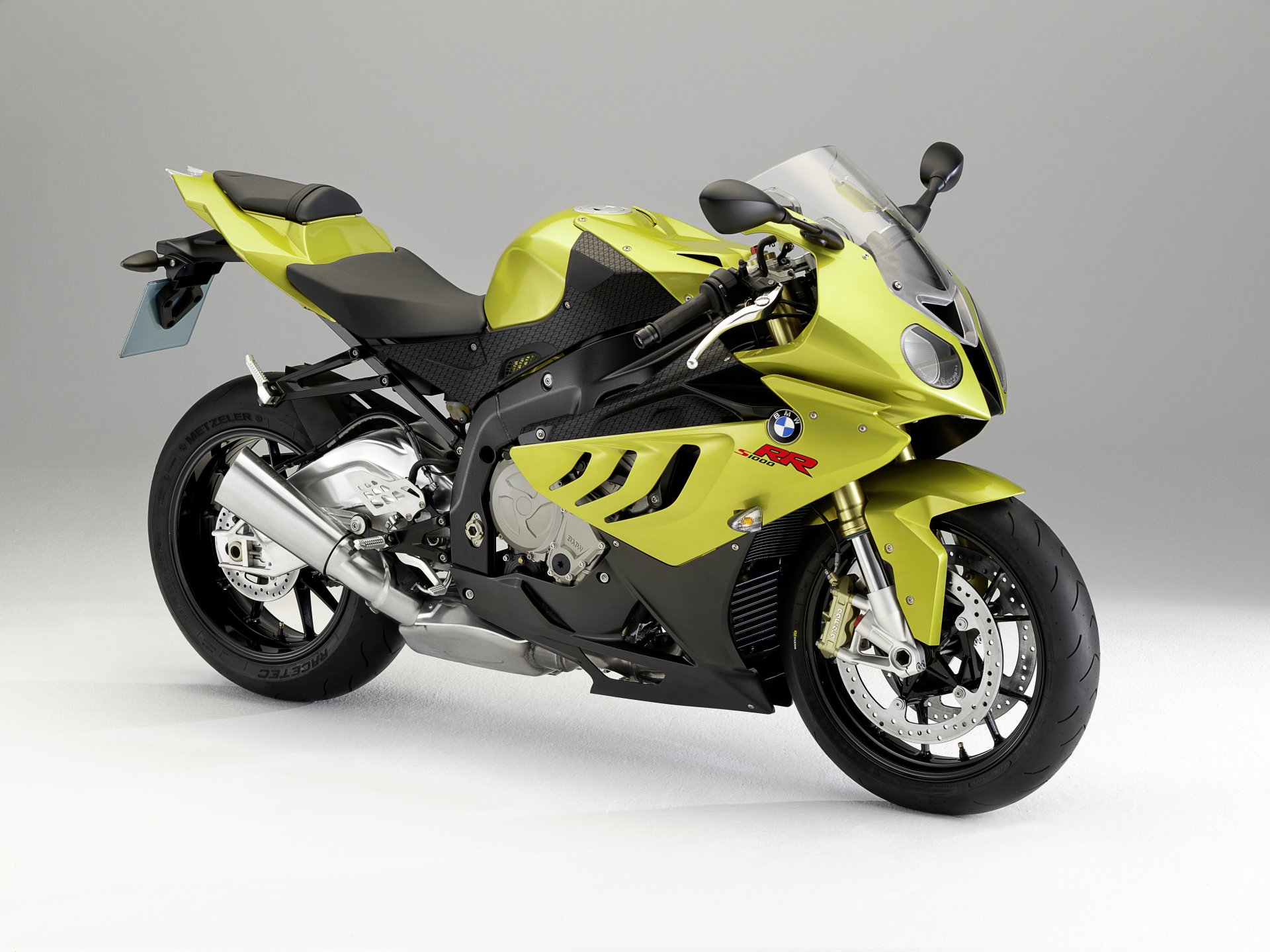 HD PC desktop wallpaper featuring a vibrant yellow BMW S1000RR motorcycle, showcasing the sleek design of the BMW S1000 vehicle.