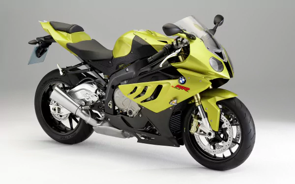 HD PC desktop wallpaper featuring a vibrant yellow BMW S1000RR motorcycle, showcasing the sleek design of the BMW S1000 vehicle.