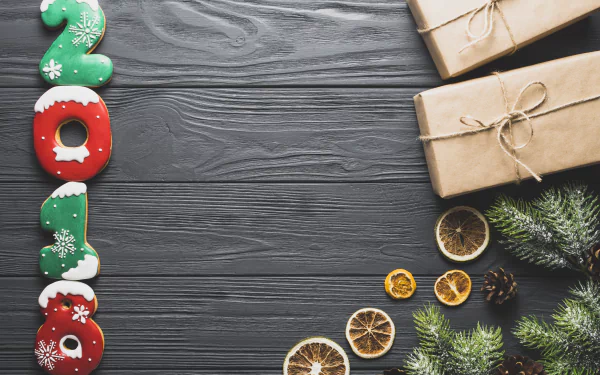 4K Ultra HD New Year 2018 holiday wallpaper featuring festive 2018 cookies, wrapped gifts, dried citrus slices, and pine branches on a dark wooden background.
